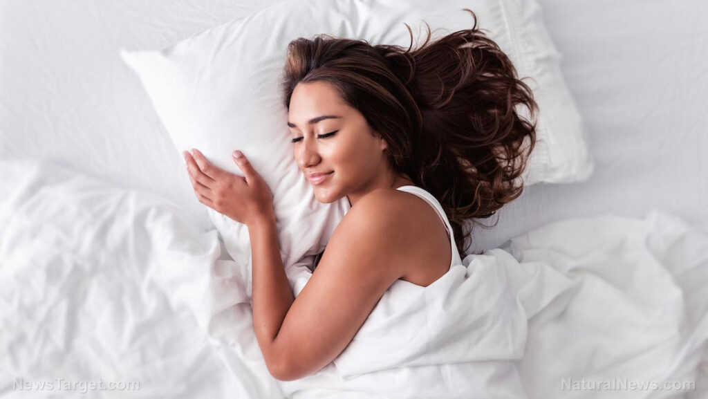 Woman-Peaceful-Sleep-Bed-Sheets-Pillow